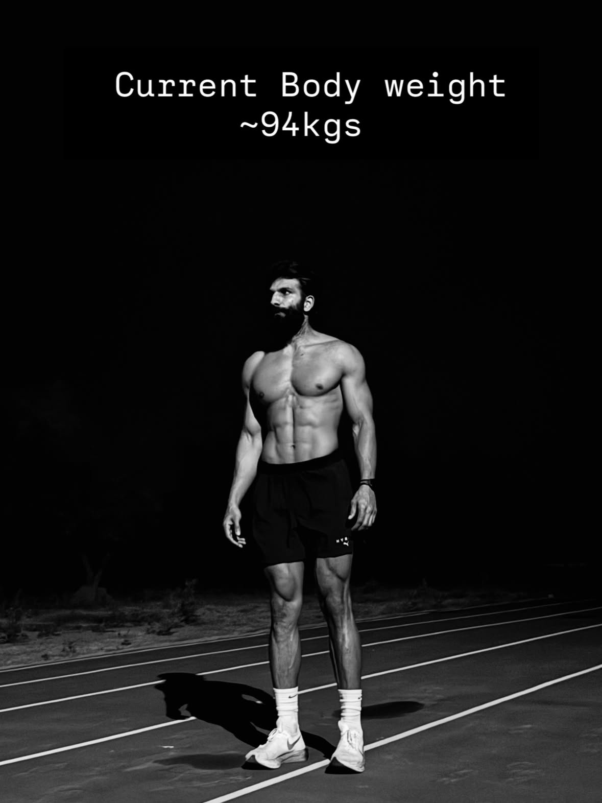 Vikas Yadav standing on a running track